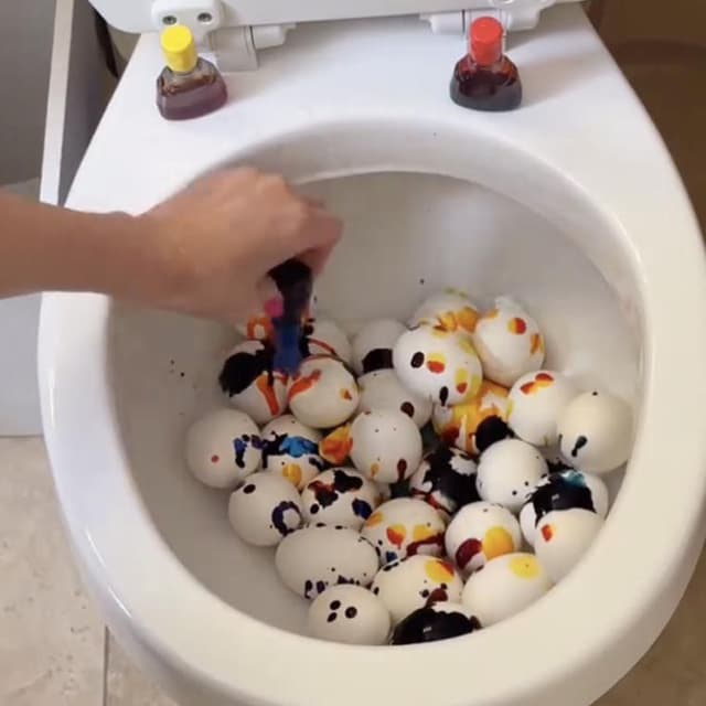 Eating Easter Eggs Dyed in the Toilet Bowl